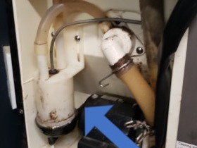 Hoshizaki ice machine repair: fixing a water leak caused by soda lime buildup