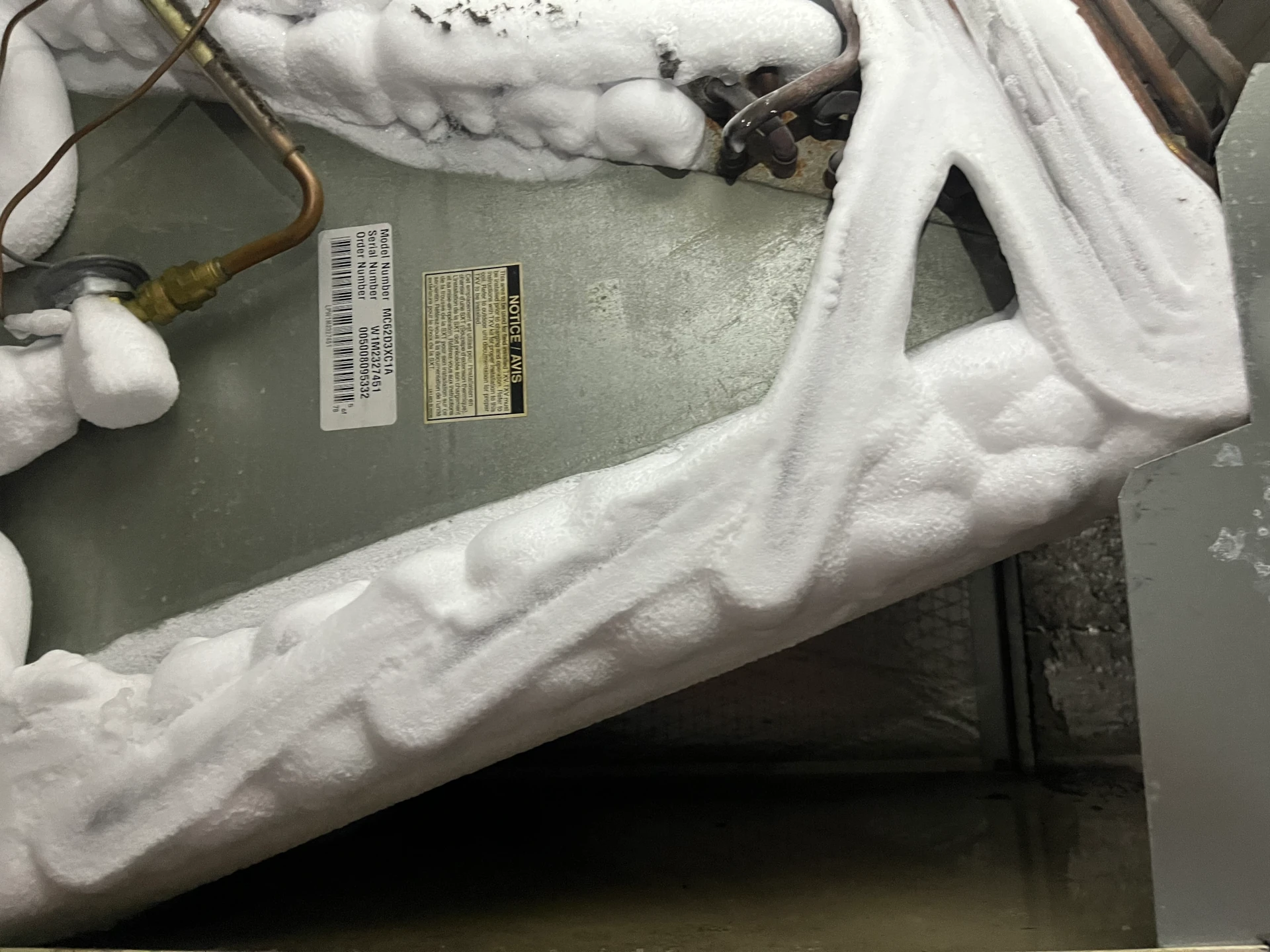 image of frozen air conditioner evaporator coil in clifton NJ caused by a dirty filter
